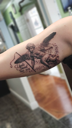 Explore family crest tattoo ideas, creative tattoo ideas in Longwood, available at Trinity Tattoo Co Inc