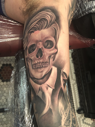 Explore thug tattoo ideas, creative tattoo ideas in Junction City, available at New Era Tattoo Studio