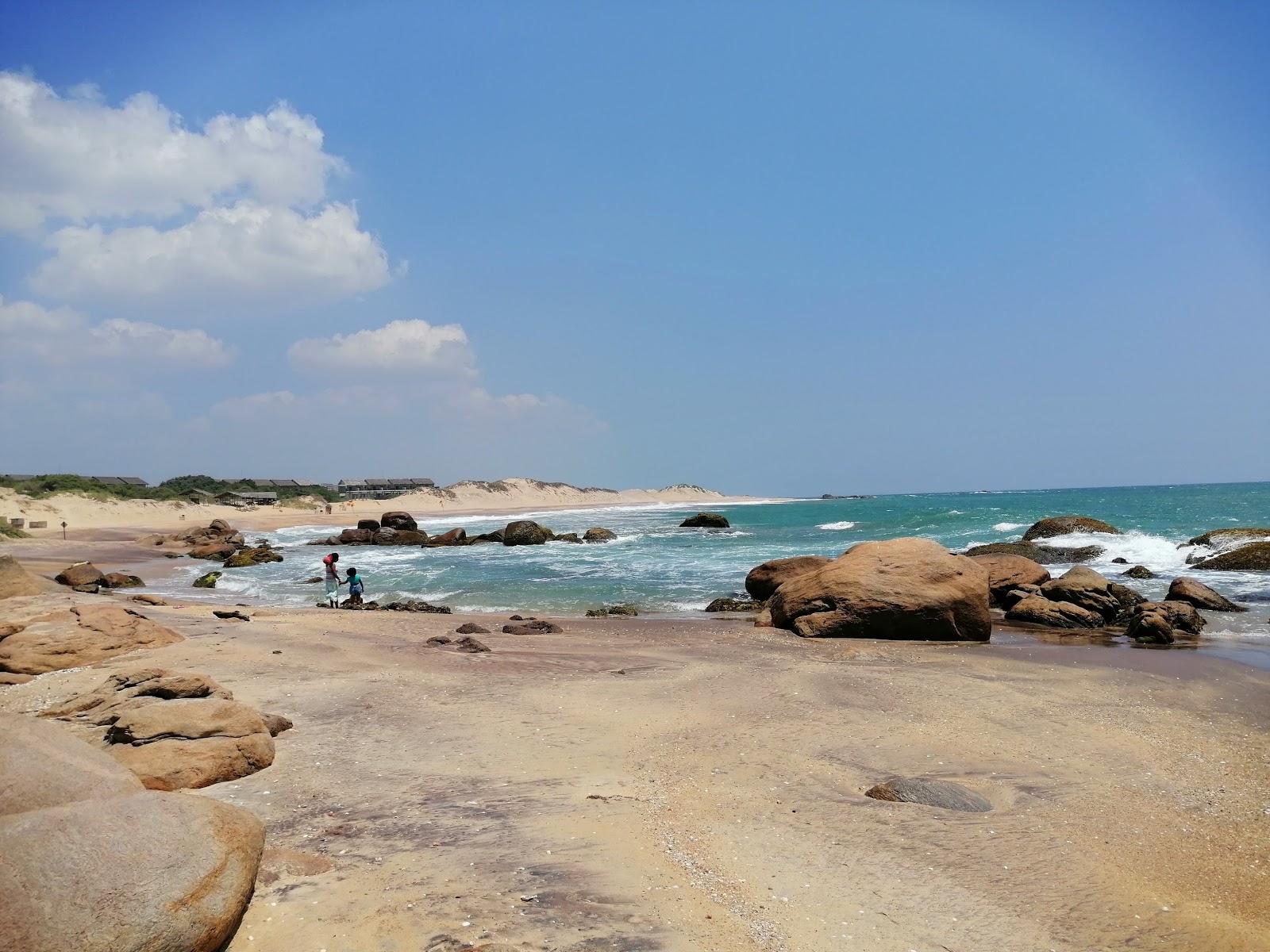 Palatupana Beach'in fotoğrafı parlak kum yüzey ile