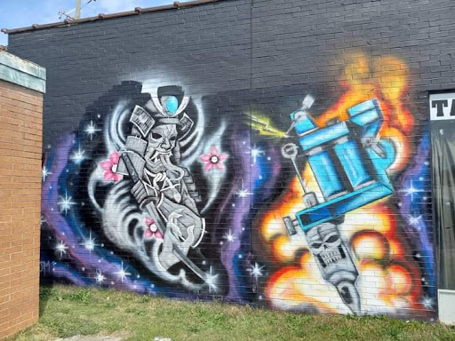 Explore rapper tattoo ideas, creative tattoo ideas in Warner Robins, available at McDonald Ink