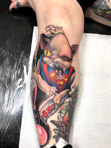 Explore red ink neck tattoo ideas, creative tattoo ideas in Tallmadge, available at Killjoy tattoo