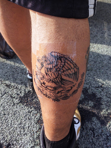 Explore black flower tattoo ideas, creative tattoo ideas in Riverside, available at The Madd Tatterz Tattoo Parlor