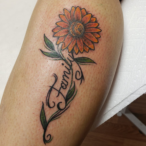 Explore small lion tattoo ideas, creative tattoo ideas in Export, available at Patriotic pain tattoo