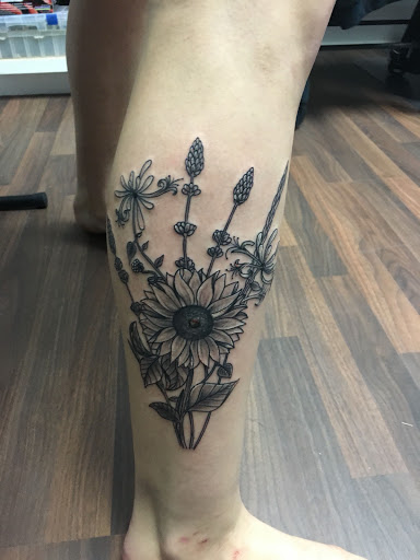 Explore small thigh tattoo ideas, creative tattoo ideas in Wake Forest, available at Revelation Ink Tattoo and Piercing