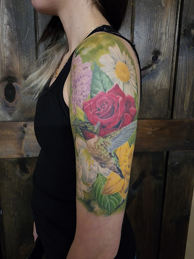 Explore michelangelo tattoo ideas, creative tattoo ideas in Green Bay, available at The Blue Gem Tattooing