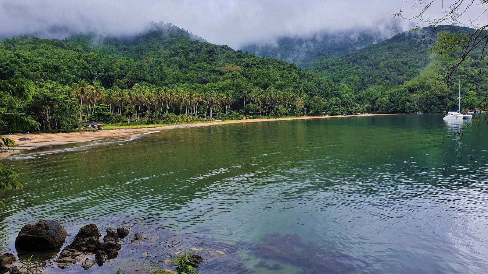 Foto de Praia da Tapera com areia bege superfície