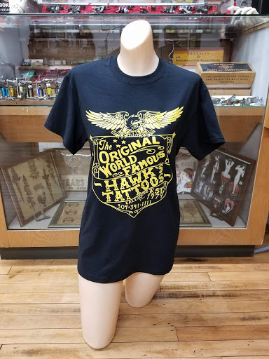 Explore word finger tattoo ideas, creative tattoo ideas in Galesburg, available at Hawks Tattoos