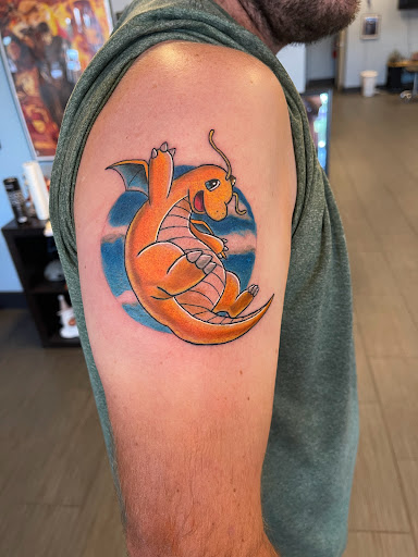 Find book of tattoo ideas for your next unique tattoo in Palm Harbor at Angry Owl Tattoo and Piercing