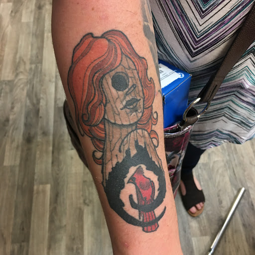 Explore skull neck tattoo ideas, creative tattoo ideas in Little Falls, available at Elliotts Tattoo