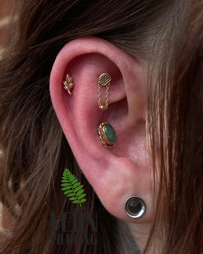 Explore neon tattoo ideas, creative tattoo ideas in Greensboro, available at Fern Piercing and Fine Jewelry