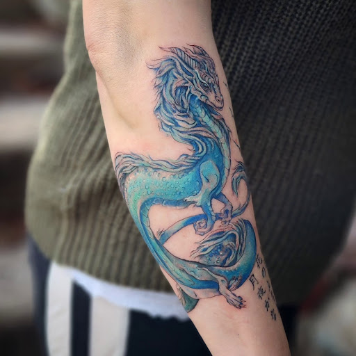 Explore male shoulder tattoo ideas, creative tattoo ideas in Minocqua, available at Whisky Rose Tattoo Parlor