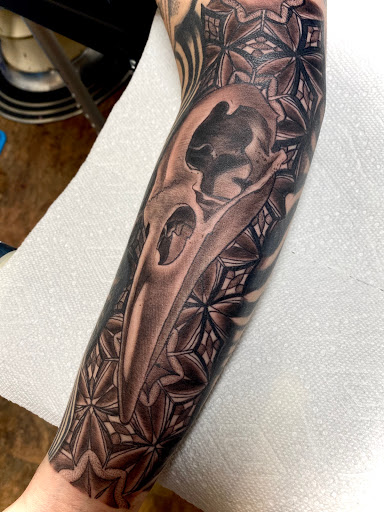 Explore puppy tattoo ideas, creative tattoo ideas in Tacoma, available at Tsunami Tattoo