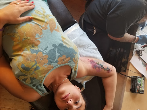 Explore bikini tattoo ideas, creative tattoo ideas in San Diego, available at Vivid Tattoo