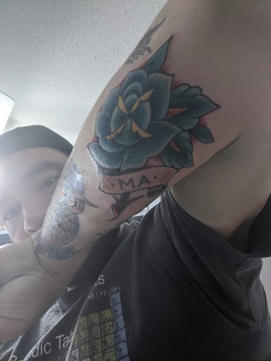 Explore lupus tattoo ideas, creative tattoo ideas in Danbury, available at Danbury Tattoo & Piercing