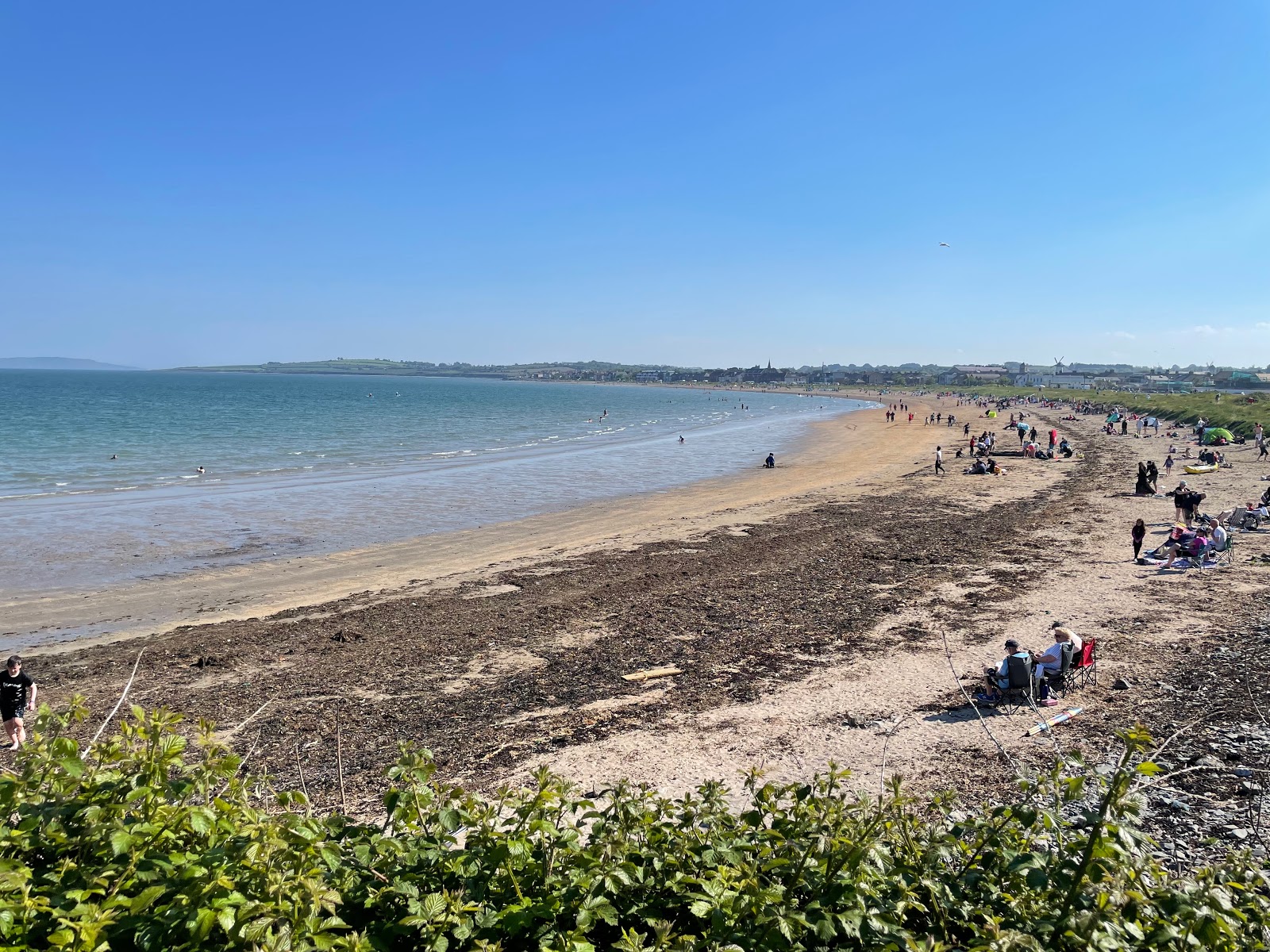 Foto av Skerries Beach med beige sand yta