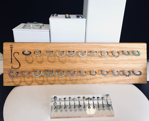 Explore rock music tattoo ideas, creative tattoo ideas in Addison, available at Cat Tattoo