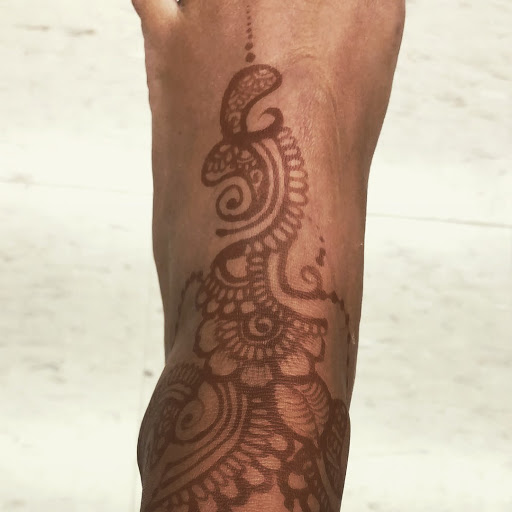Explore tim burton tattoo sleeve ideas, creative tattoo ideas in Houston, available at Paisleys and Swirls - Henna Artist in Houston