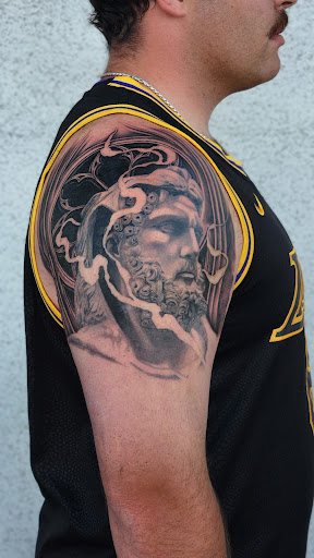 Find addams family tattoo ideas for your next unique tattoo in San Diego at Bay Ink Tattoo & Piercing