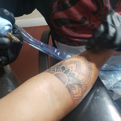 Explore lower back tattoo ideas for females, creative tattoo ideas in Fremont, available at Inkies Tattoo Studio