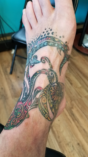 Explore dog paw tattoos ideas, creative tattoo ideas in Muncie, available at Abandon all hope tattoo and body piercing