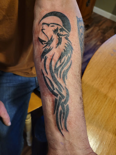 Explore magician tattoo ideas, creative tattoo ideas in Portsmouth, available at Hobos Tattoo