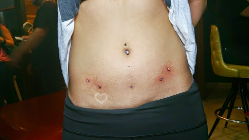 Explore men's knuckle tattoo ideas, creative tattoo ideas in Chandler, available at 24 Hour Tattoo & Piercing