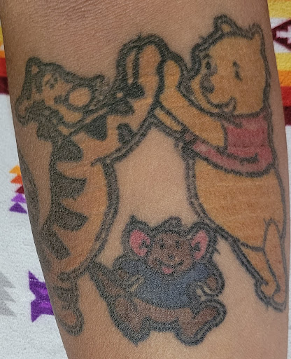 Explore kratos tattoo ideas, creative tattoo ideas in Arlington, available at Urbans Tattoo & Piercing Studio