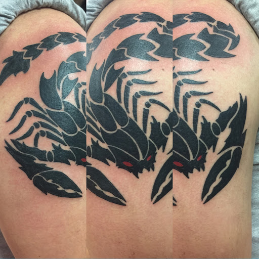 Find music tattoo ideas for men for your next unique tattoo in Baton Rouge at Sacred Art Tattoo Studio