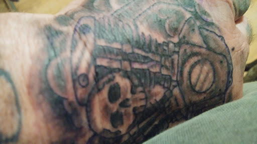 Explore tattoo cross ideas for men, creative tattoo ideas in Galesburg, available at Hawks Tattoos