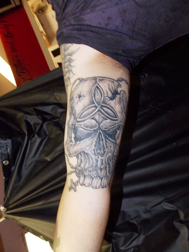 Explore cake tattoo ideas, creative tattoo ideas in Largo, available at Alchemy Tattoos and Body Piercings