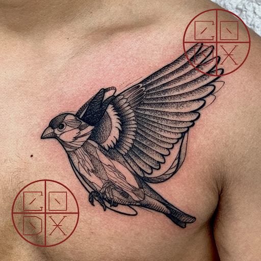 Explore tattoo back cover up ideas, creative tattoo ideas in Indianapolis, available at Golden Goose Tattoo Company