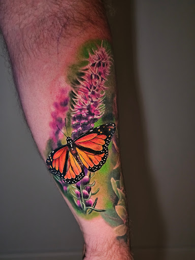 Explore statue of liberty tattoo ideas, creative tattoo ideas in Kansas City, available at Golden Stag Tattoo and Gallery