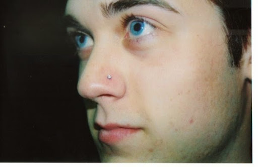 Explore cross stitch tattoo ideas, creative tattoo ideas in Madison, available at Steves Tattoo & Body Piercing