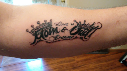 Explore angel forearm tattoo ideas, creative tattoo ideas in Rockford, available at House Of Pain Tattoo co.