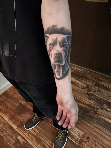 Explore rose hand tattoo ideas, creative tattoo ideas in Sheridan, available at BlackbearInk Studio LLC