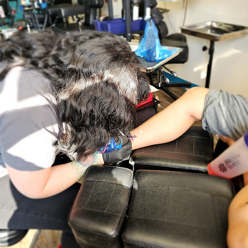 Explore tattoo ideas tramp stamp, creative tattoo ideas in Traverse City, available at Pinups & Needles