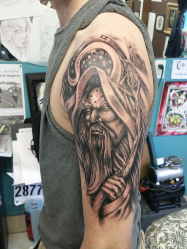 Explore chandelier tattoo ideas, creative tattoo ideas in Danville, available at Studio Ink Tattoo and Body Piercing