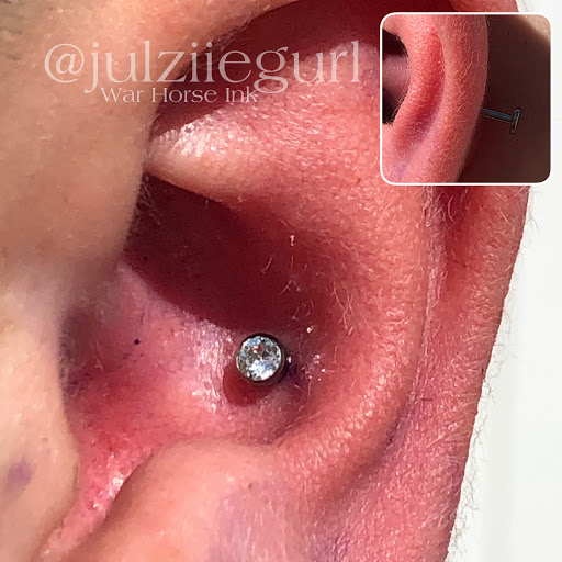 Explore roman numeral tattoo ideas, creative tattoo ideas in Kent, available at War Horse Ink