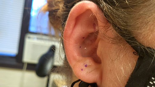 Find rib tattoo ideas for females for your next unique tattoo in Memphis at Rose Quartz Body Adornment LLC