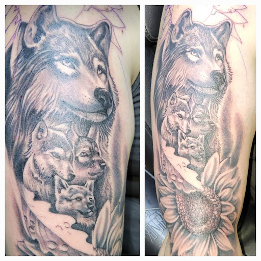 Explore ear tattoo ideas for females, creative tattoo ideas in Angola, available at Hoodlum Ink