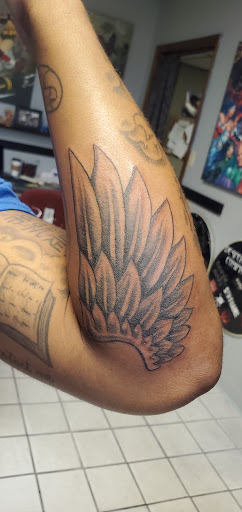 Tattoo Shop «J & M Body Gallery», reviews and photos, 132 Pipestone St, Benton Harbor, MI 49022, USA