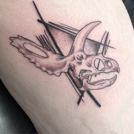 Explore race car tattoo ideas, creative tattoo ideas in Broomfield, available at Ink & Art Collective