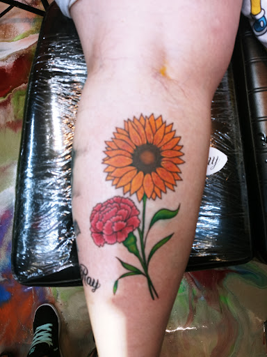 Explore family flower tattoo ideas, creative tattoo ideas in Dallas, available at 2Xtremes Tattoos & Piercing
