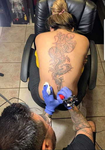 Explore marine corps sleeve tattoo ideas, creative tattoo ideas in Corpus Christi, available at Purple Ink - Tattoo & Piercing Studio