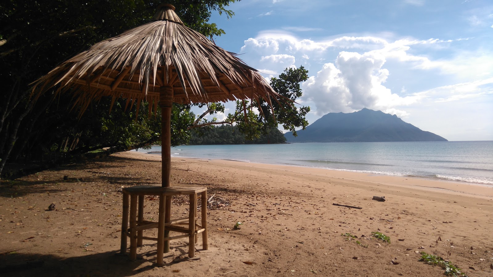 Foto av Panaguman Beach med turkos rent vatten yta