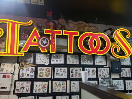 Explore tattoo ideas of strength, creative tattoo ideas in Morrow, available at The Inkers Parlour