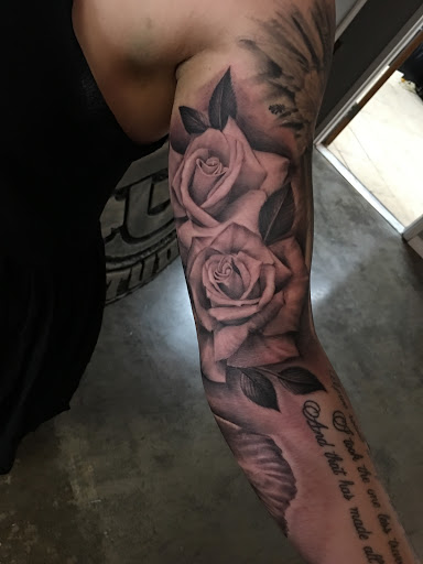 Explore picasso tattoo ideas, creative tattoo ideas in Arlington, available at Urbans Tattoo & Piercing Studio