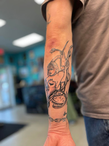 Explore rip tattoo ideas for guys, creative tattoo ideas in Scranton, available at Black Sheep Tattoo & Piercing Studio
