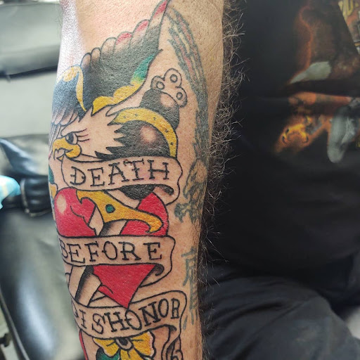 Explore forearm rose tattoo ideas, creative tattoo ideas in Milan, available at Davis Tattoo Company