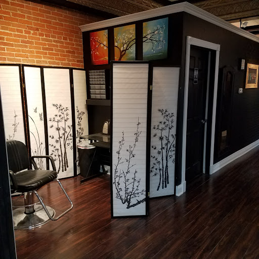 Explore hand small tattoo ideas, creative tattoo ideas in Dubuque, available at The Crows Nest